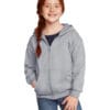 Smiling girl with red hair in hoodie.